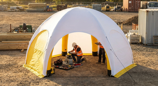 Inflatable work tent in white and yellow, industrial use